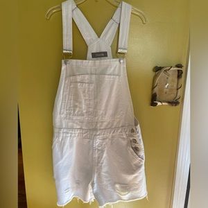 White woman’s overalls